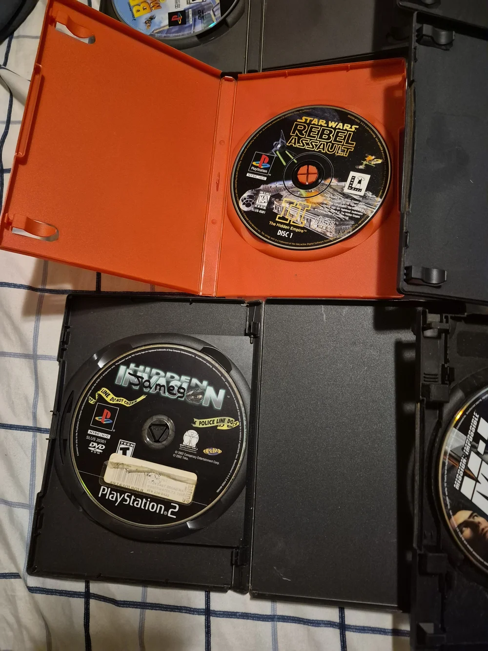 Sony PlayStation 2 Game Disc Bundle with Black and Red Cases. Lot Of 6